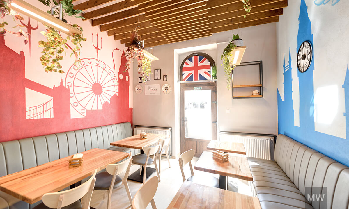 Restaurant entry with British flag on top of the door