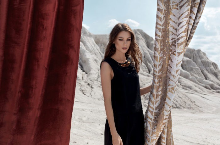 Castellano terracotta colored fabric curtain