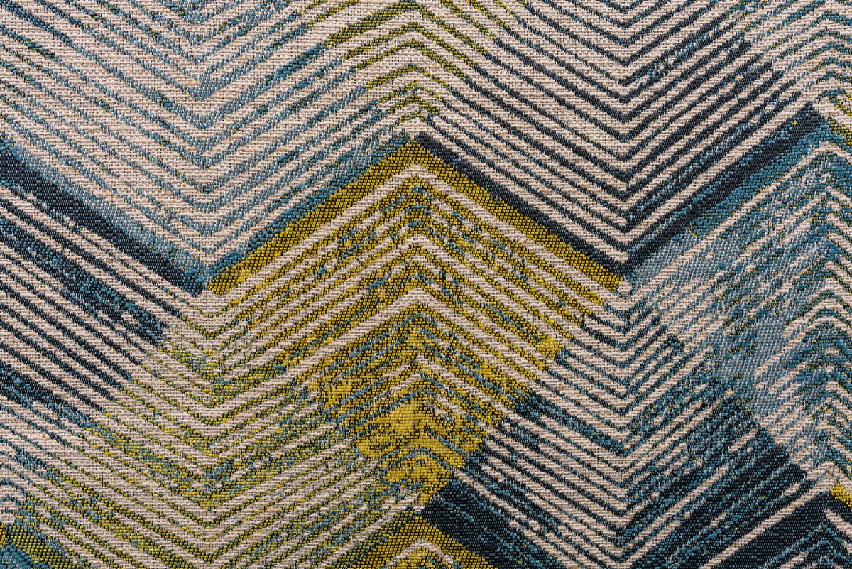 Utopia curtain green colored fabric with triangle pattern