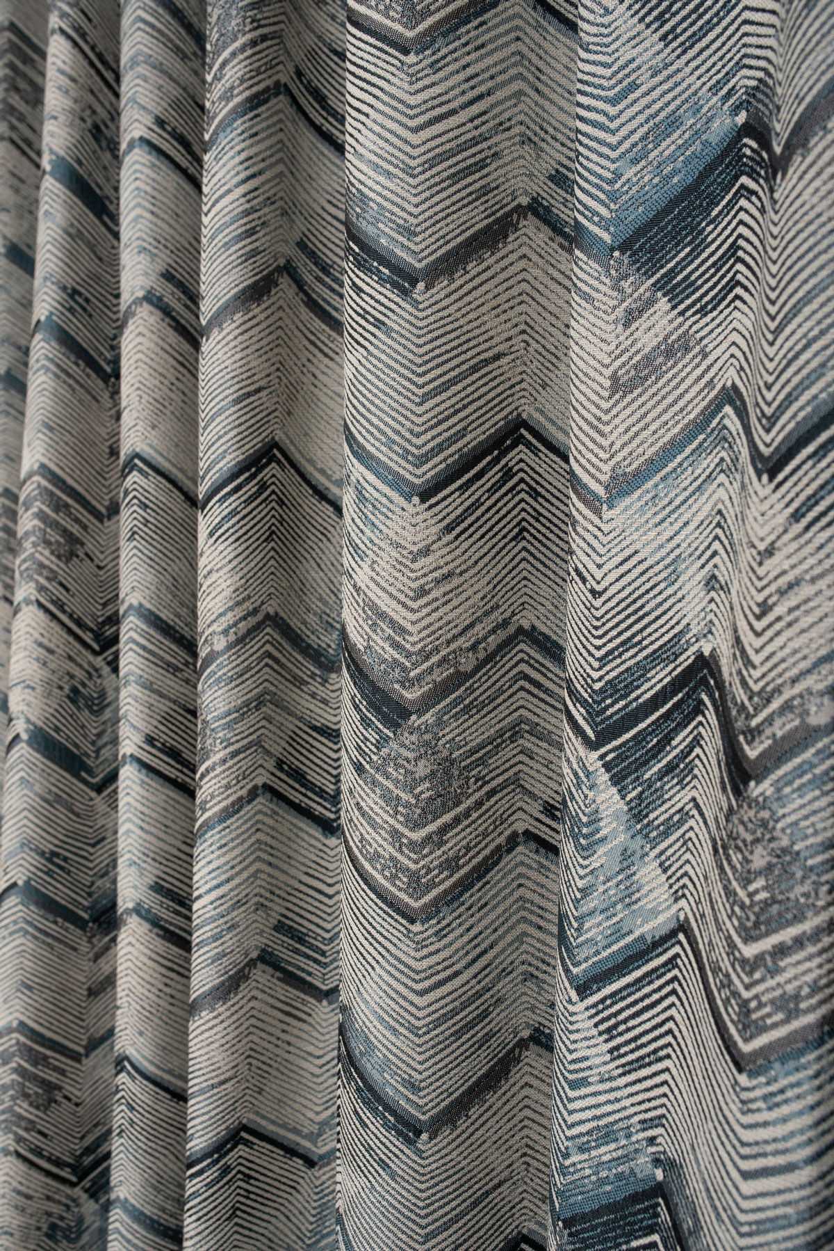 Utopia curtain blue colored fabric with triangle pattern