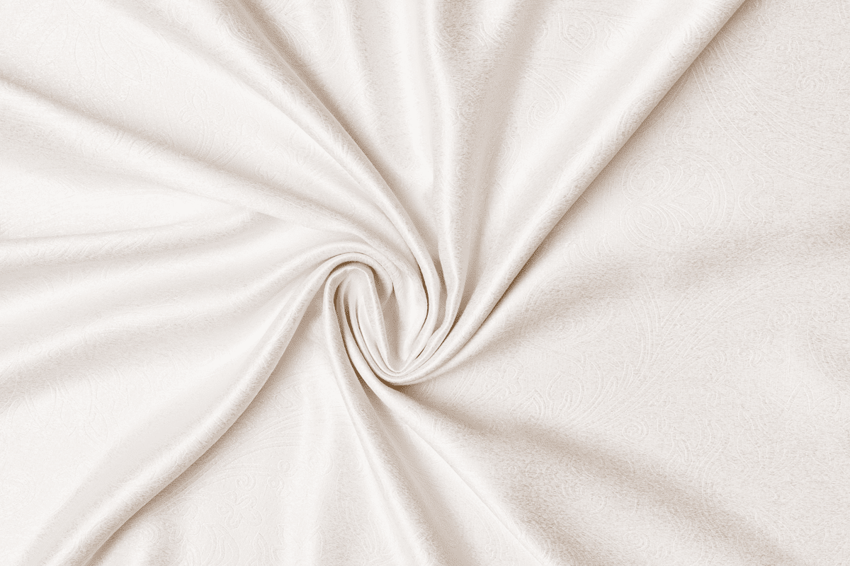 cora white colored material curtain