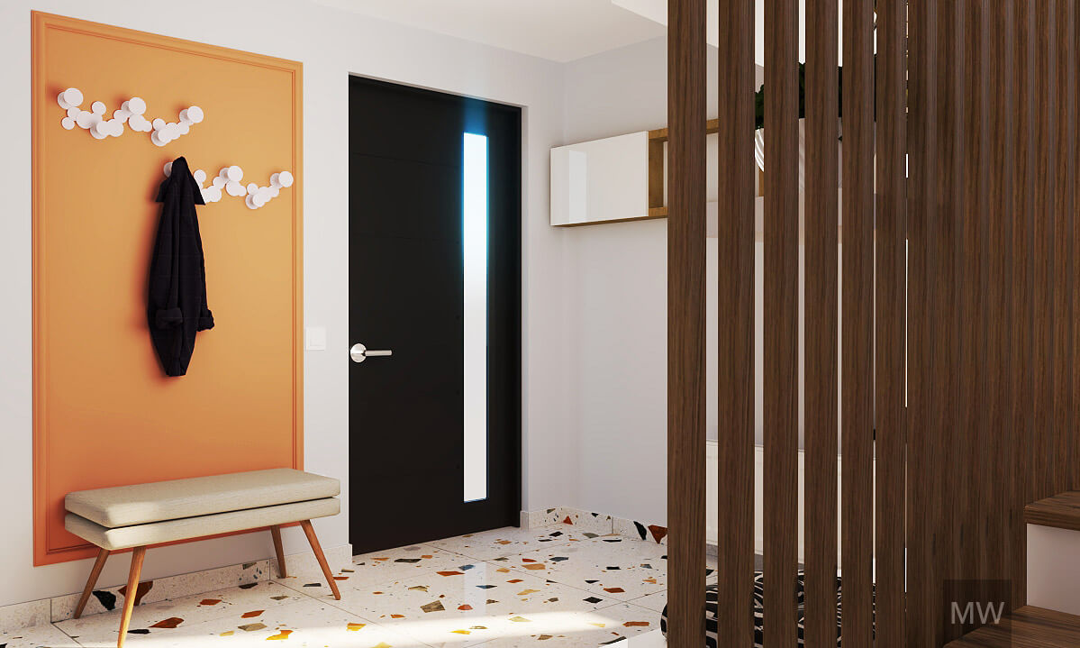Entrance door in hallway with terrazzo tiles and coral color