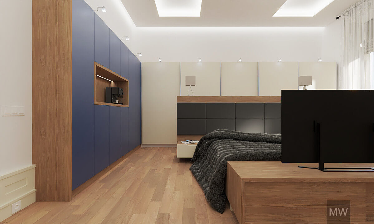 Bedroom with large wardrobe on two sides