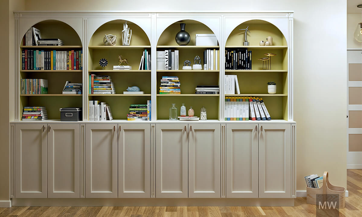 Big bookshelves and hiden storage in entrance area Lot of storage space in lower part of bookshelves. Lime green background for displaying decorations and books.